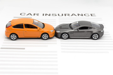 Accident toy car with toy car insurance concept