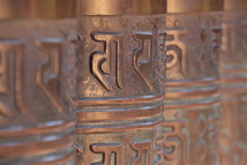 Close Up view of prayer wheels in a shrine in Japan