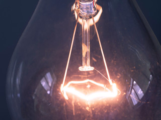 close up of glowing element in the incandescent bulb