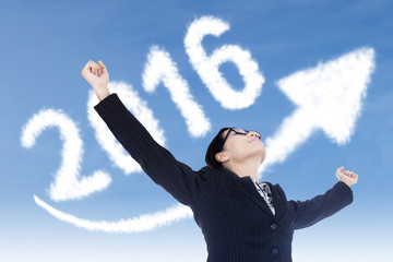 Successful woman with arrow and numbers 2016