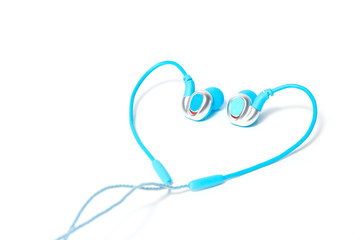 Earphone in heart shape isolated on white