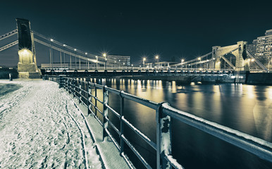 view on bridge at night in winter time in wroclaw, poland - obrazy, fototapety, plakaty