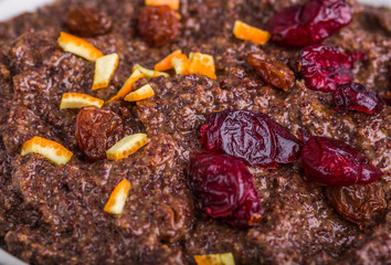poppy seed mass with raisins, cranberries, orange peel