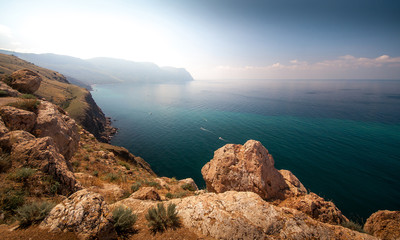 Beautiful sunny view of the coastline, the cliffs and the sea. Cape Balaklava. Balaclava. Crimea. Ukraine