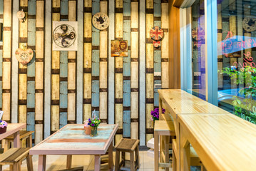 Relax corner with chair and table interior of modern cafe.