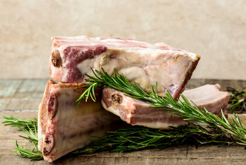 three smoked pork ribs with rosemary and laurel