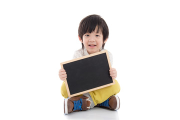 asian boy holding black board on white background isolated