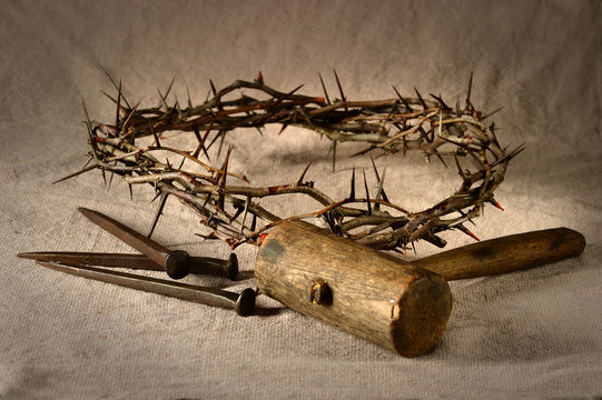 Crown of Thorns and Nails with Mallet over Cloth