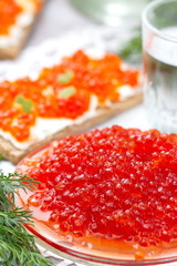 Red caviar and cold vodka