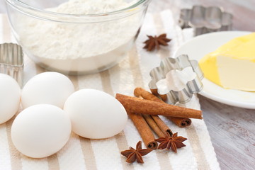 Baking ingredients: eggs, flour and spices.