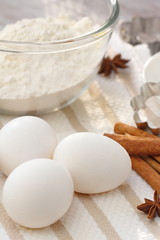 Fototapeta na wymiar Baking ingredients: eggs, flour and spices.