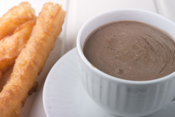 churros con chocolate, a typical Spanish sweet snack
