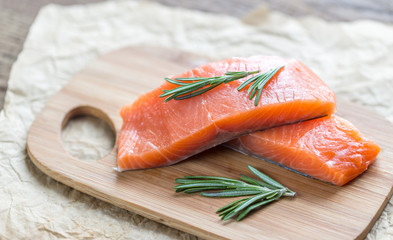 Raw salmon on the wooden board