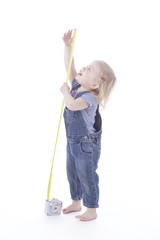 toddler girl measuring