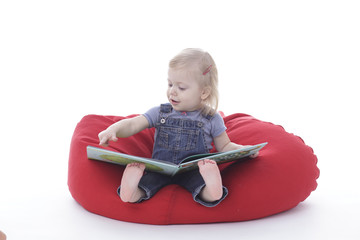 toddler girl reading