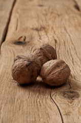 Closed nuts closeup on a wooden table