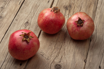 Fototapeta na wymiar Whole pomegranate fruit