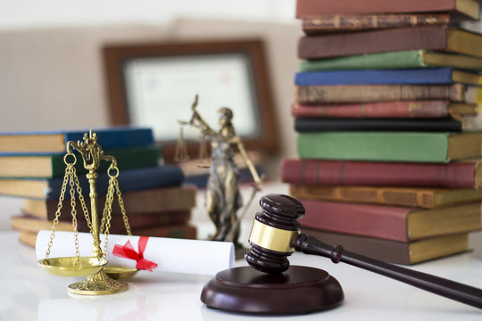 Law concept, statue, gavel, scale, books and diploma