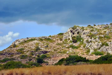 Foto op Canvas rocky cliff on the island of Rhodes. © GKor