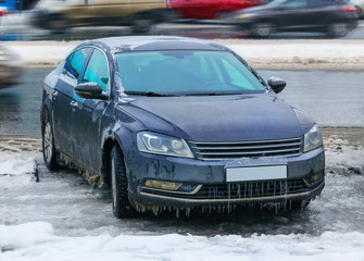 Fototapeta premium icy car in winter