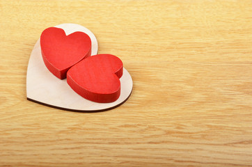 Heart on wooden background