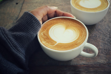 Two cups of latte art coffee