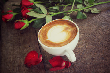 Latte art coffee with red road for valentine day