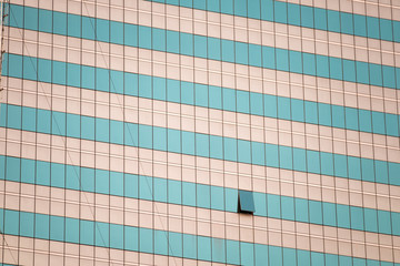 Opening Window : A office building of Telecom Public Company Limited(CAT), a state enterprises, is on Charoen krung Rd. in Bangkok,Thailand.