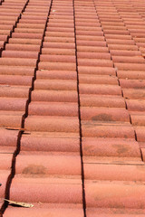 brown tile roof weathered on building residential