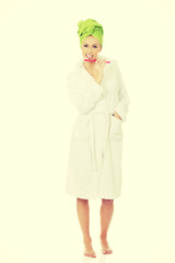 Beautiful woman with toothbrush.