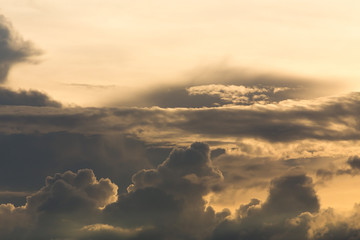 beautiful sunset sky, golden light of sun on dramatic moody sky