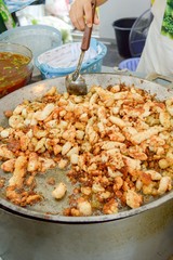 Egg squid fried on the pan