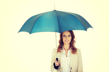 Businesswoman holding an umbrella.