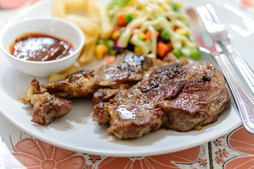 Beef steak on plate.Soft focus.