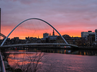 Fototapeta na wymiar Newcastle upon Tyne- Sunset at Gateshead Millennium Bridge