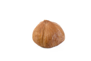 peeled hazelnut isolated on white background