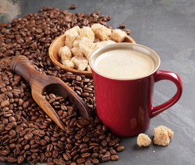 Coffee cup, beans and brown sugar