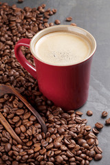 Coffee cup and beans