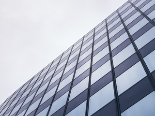 Fototapeta na wymiar Architecture detail Modern Glass facade Pattern Background
