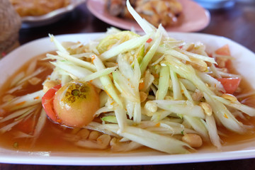 Papaya salad Thai cuisine spicy delicious with vegetables