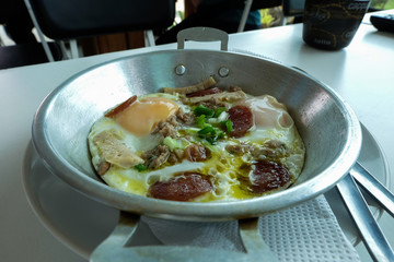 Indochina pan-fried egg with pork and toppings, Breakfast food in Thai style