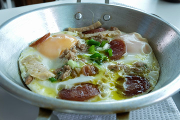Indochina pan-fried egg with pork and toppings, Breakfast food in Thai style