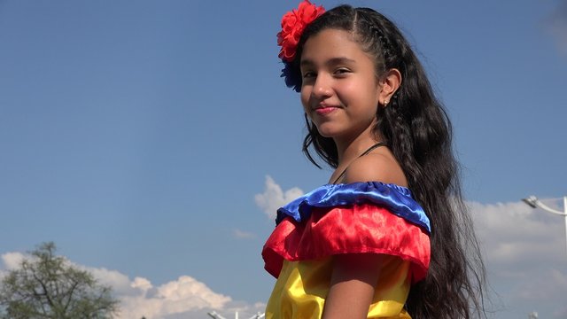 Happy Girl Wearing Traditional Colombian Dress