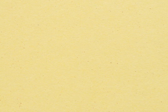 Paper texture - yellow kraft sheet background.