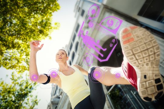 Composite image of a pretty woman running in the street  - Powered by Adobe