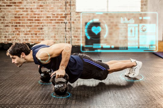 Composite image of man doing push ups with kettlebell - Powered by Adobe