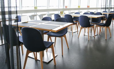 restaurant interior with tables and chairs