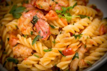 Fusilli ai gamberi e pomodoro, pasta with shrimps and tomato sauce