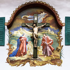 Painting house wall with crucifixion, Bavaria, Germany