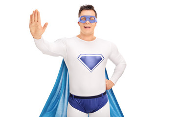 Superhero making a stop gesture